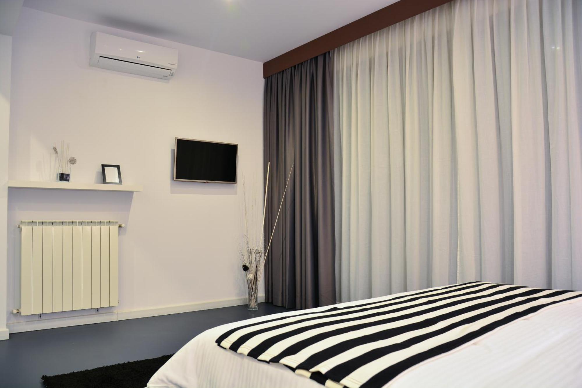בוקרשט Living Aparthotel חדר תמונה